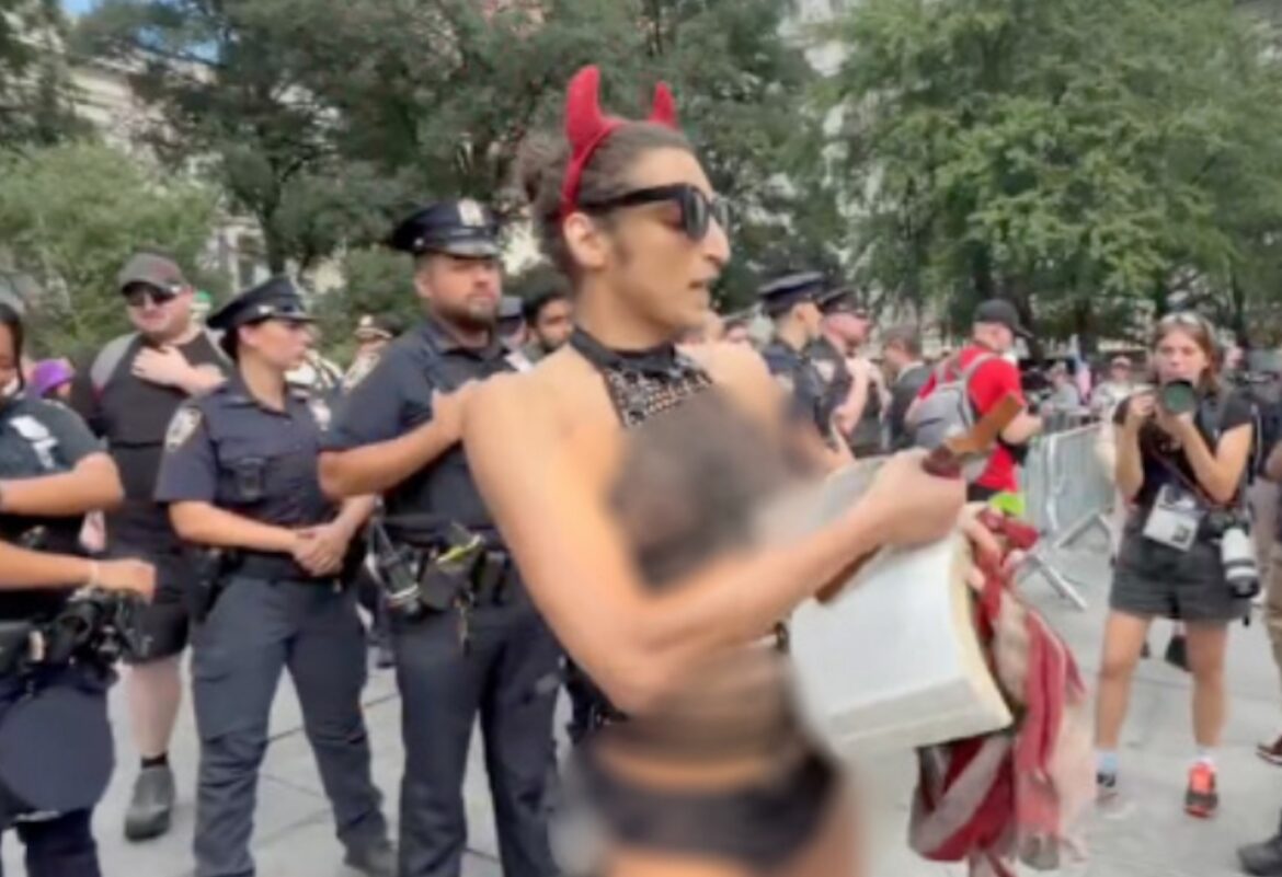Transgender Performer Tears Bible Pages During NYC 9/11 Counter-Protest